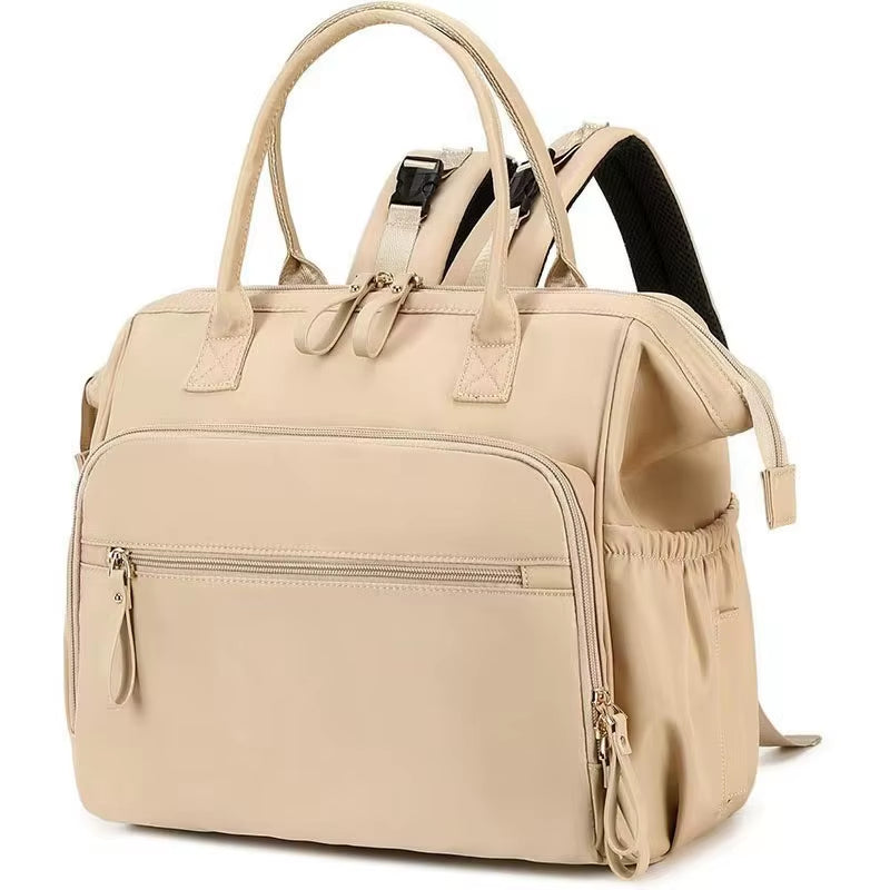 תיק החתלה לאימהות בצבע בז' עם מבנה מרווח ונוח